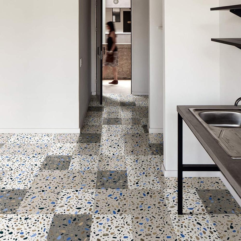 design szines terrazzo cementlap greslap fiatalos padlolap jarolap kek piros padloburkolat kohatasu modern loft szurke burkolat etterem bisztro kavezo.jpg